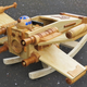 Illustration for article titled This Exquisite Wooden X-wing Rocker Will Make You Miss Being a Kid